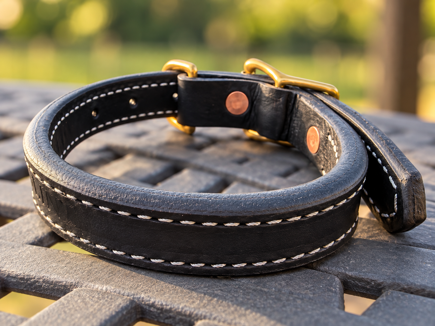 Interior and reverse of 1 inch leather working collar showing stitching and rivets