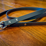 Black BioThane leash with snap clasp and replaceable Chicago screw hardware