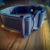 Angled view of black leather COBRA collar with contrasting stitching and quick-release buckle