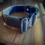 Black leather COBRA collar showing layered leather edge and buckle profile